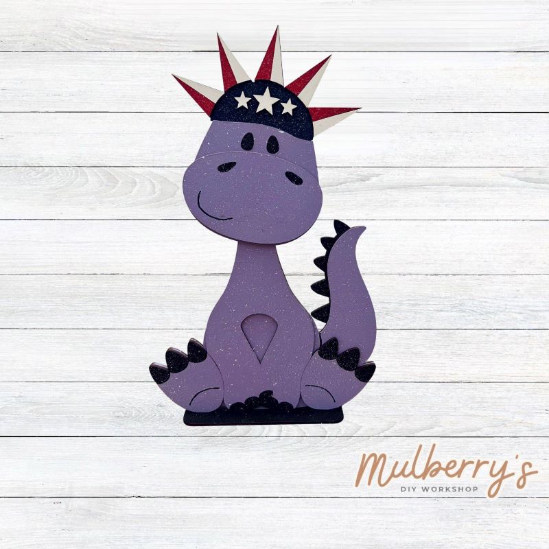 Our brachiosaurus dinosaur is super cute! It's approximately 13" tall and can be paired with your favorite seasonal/holiday insert.
This set includes the interchangeable brachiosaurus dinosaur and your choice of July 4th inserts:
-Headband with Bow Tie
-Headbow
-Statue of Liberty Spike Hat
Please note that different inserts fit each type of dinosaur base differently. For our interchangeable brachiosaurus, we recommended pairing it with the headband and bowtie inserts.