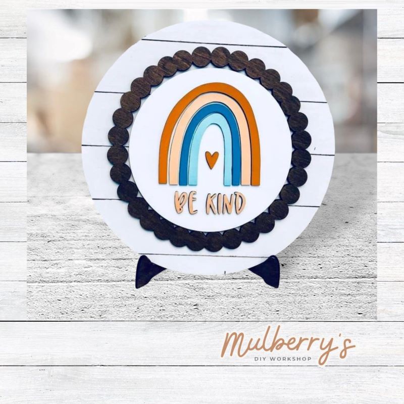 We love our large interchangeable plate with stand! It's approximately 11.5-inches is diameter and can display your favorite seasonal/holiday insert. This set includes the large interchangeable plate with stand and the be kind rainbow insert.