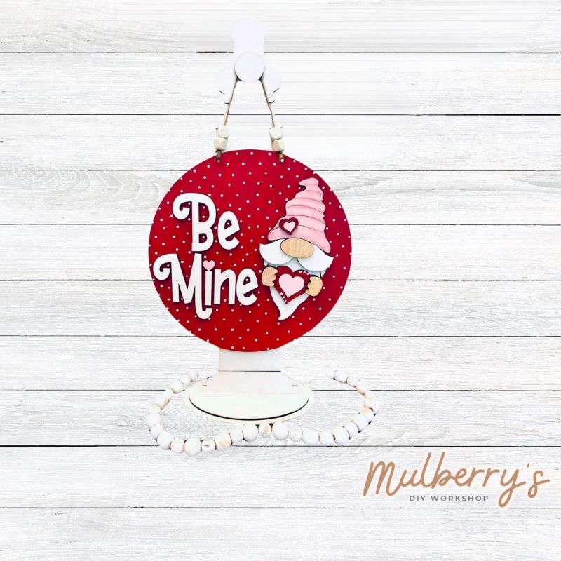 Our Be Mine Gnome mini door hanger is just too cute! Approximately 10.5" in diameter.