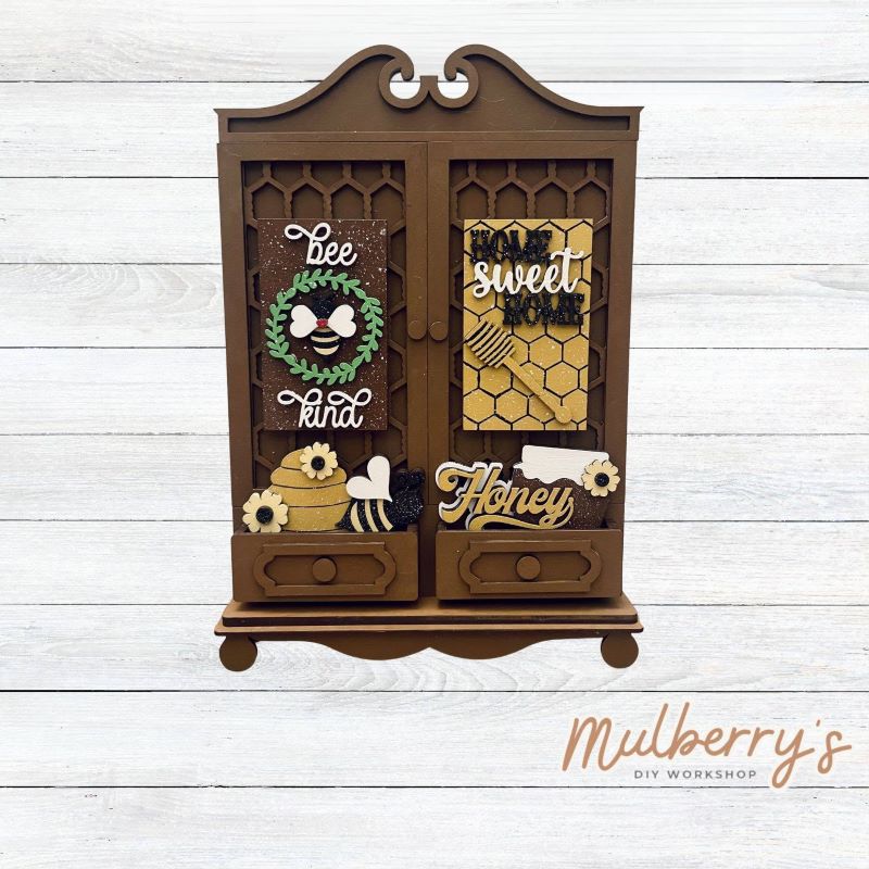 It doesn't get any cuter than our new double cottage mega shelf sitter! It's the perfect add-on accessory to your decor at approximately 16" tall by 11" wide.
Includes: Double Cottage and Bee Inserts pictured.