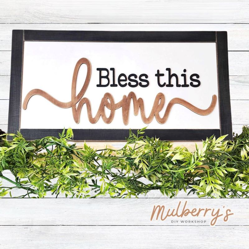 Our bless this home sign with frame is rougly 9" tall by 18" wide. Optional stand is available.