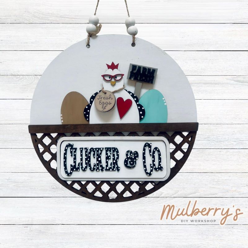 Welcome family and friends with our interchangeable lattice round door hanger! Simply swap out inserts to match the different holidays and seasons! It's approximately 10.5" in diameter. Includes: Lattice Round Door Hanger with Chicken Inserts. Additional inserts are available to purchase.