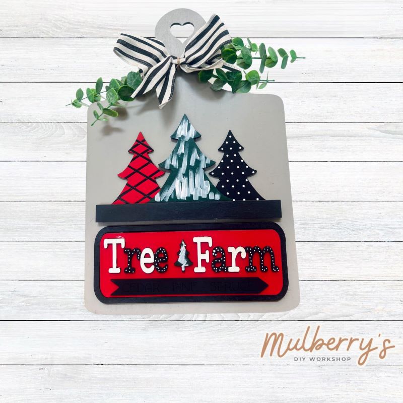 This Interchangeable Breadboard measures roughly 9" wide & 13.5" tall. This project can easily be changed out for holidays, seasons and other themes. Because the breadboard leans back with the use of an easel, no magnets or adhesive hook and loop is needed. The set includes the breadboard and Christmas tree inserts.