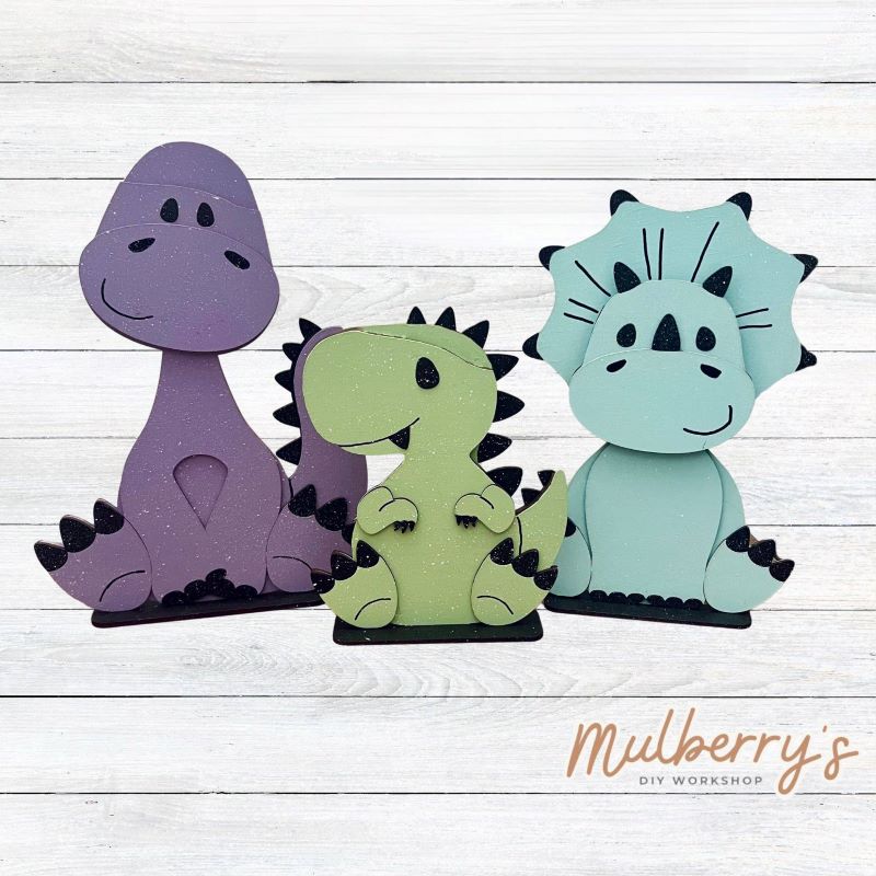 We love our interchangeable dinosaurs!
Brachiosaurus: Approximately 13" tall
T-Rex: Approximately 8" tall
Triceratops: Approximately 11.5" tall
Each dinosaur can be paired with your favorite seasonal/holiday insert.