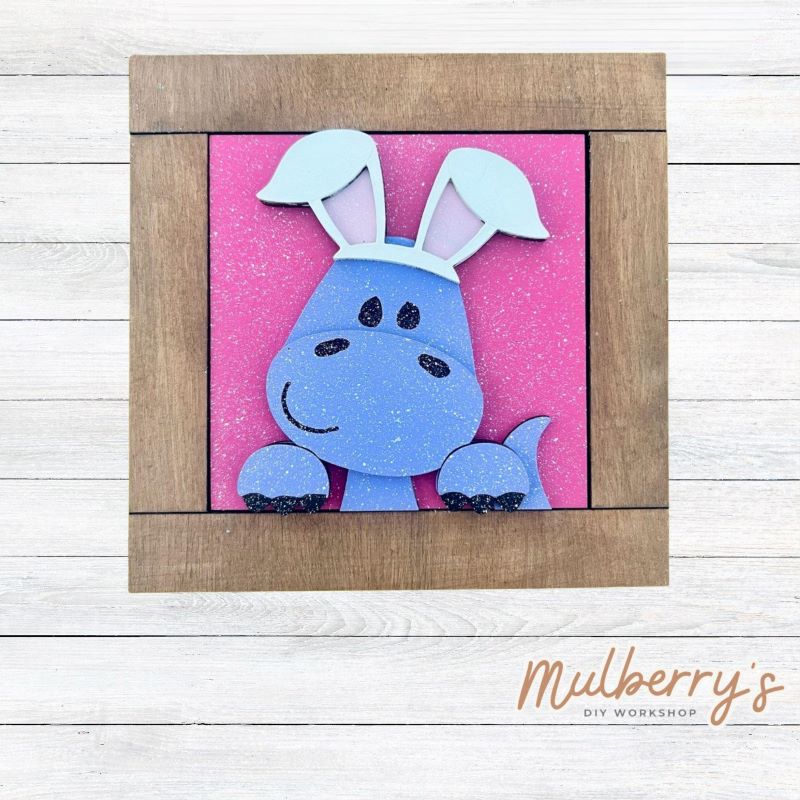 Our interchangeable square frame is the perfect way to display the different seasonal and holiday decorative tiles! Choose your favorite Easter dino decorative tile to display inside! This listing includes the base and choice of one Easter dino insert. Approximately 6" in diameter.