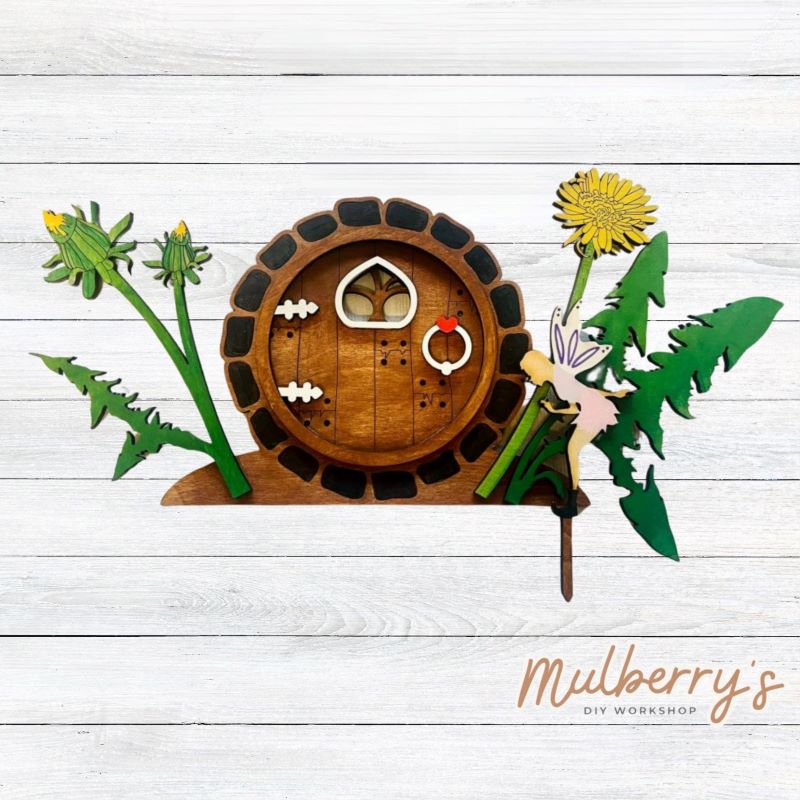 Create your own fairy garden accessories! We have two options to choose from: oval door with tulips or round door with dandelions.