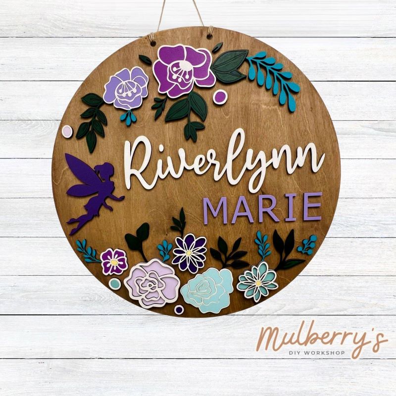 Decorate your little one's nursery with our personalized fairy nursery 22" door hanger!