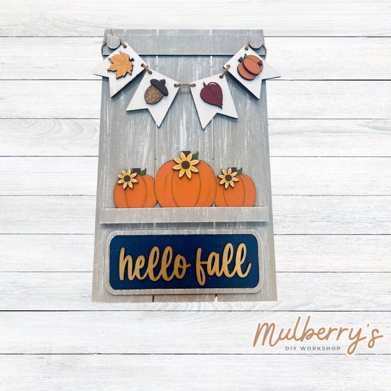 Our Interchangeable Pallet Stand measures roughly 15" tall by 9" wide. This project can easily be changed out for holidays, seasons and other themes. The set includes the pallet stand and fall inserts.