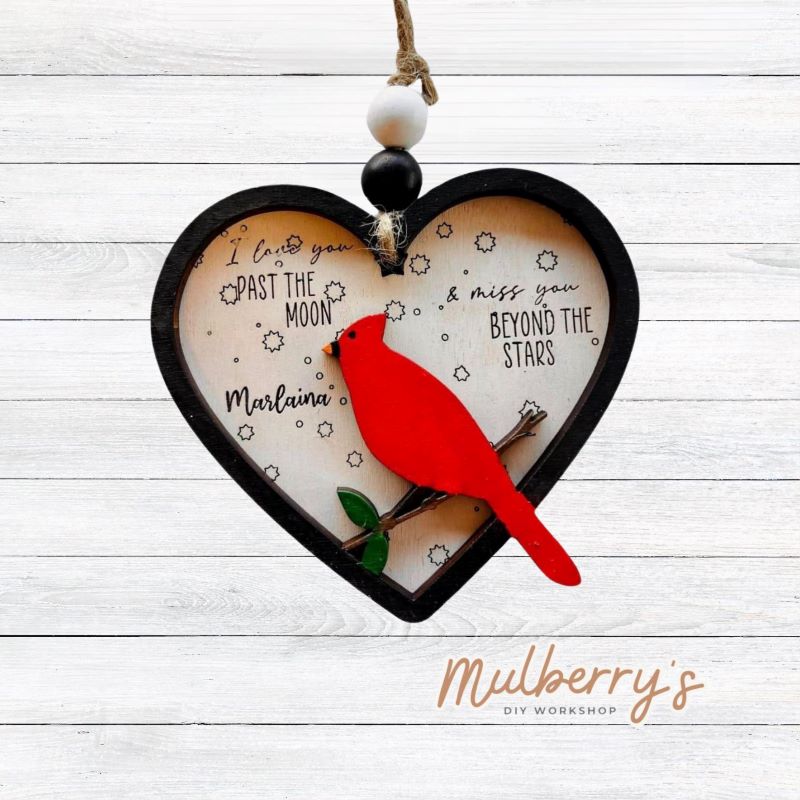 Our personalized heart-shaped cardinal ornament is a special remembrance keepsake! Approximately 4.5" tall.