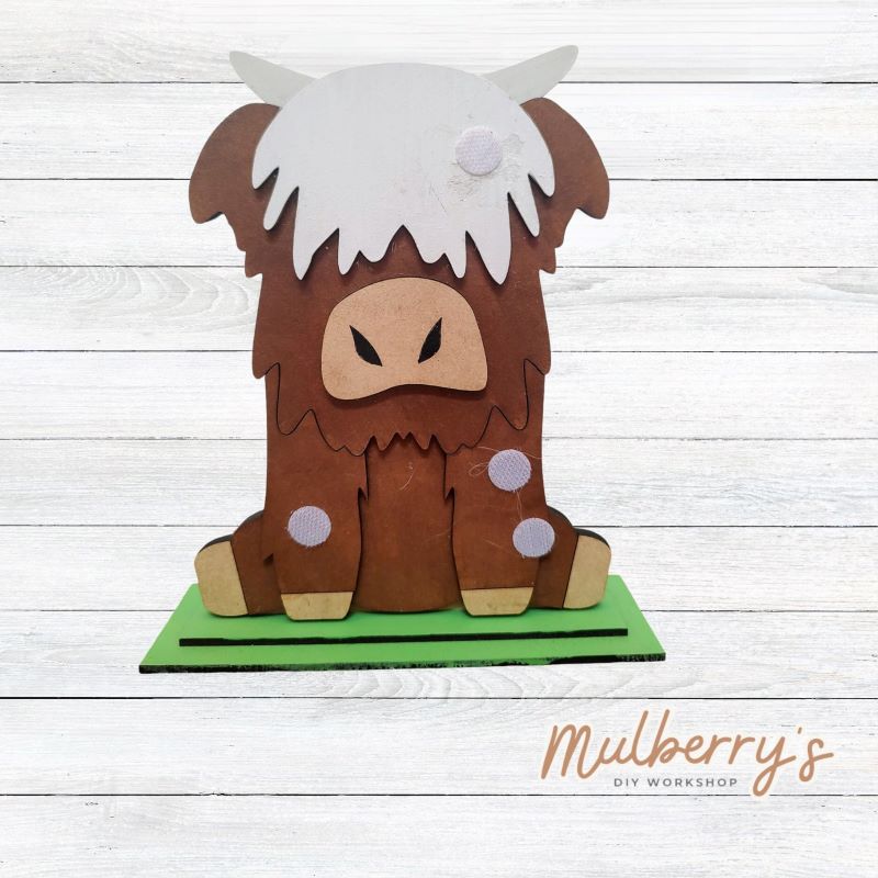 Our interchangeable highland cow is mootastic! He's interchangeable for every season/holiday and is approximately 9" tall.