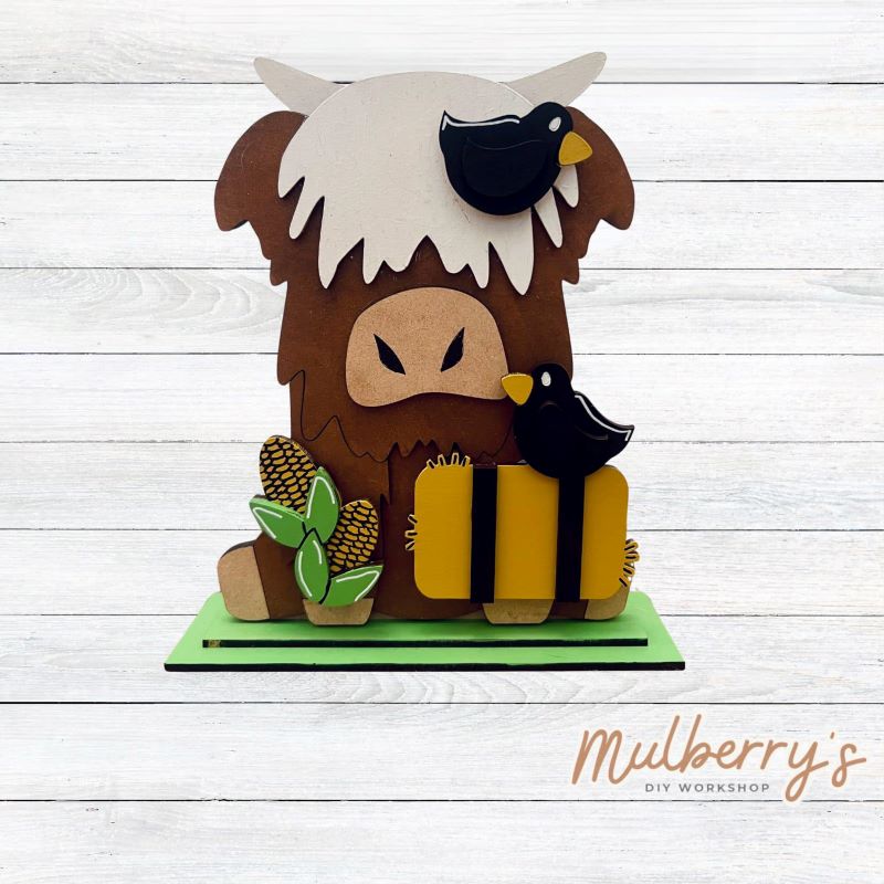 Our interchangeable highland cow is mootastic! He's interchangeable for every season/holiday and is approximately 9" tall.