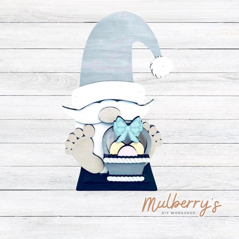 Our cute little interchangeable gnome sitter is a must! He measures 12-inches tall. Swap out his inserts to keep him ready for each holiday and season. Includes interchangeable gnome with Easter bunny insert.