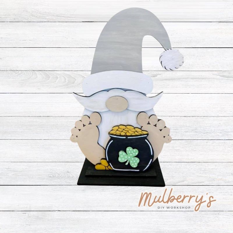 Our cute little interchangeable gnome sitter is a must! He measures 12-inches tall. Swap out his inserts to keep him ready for each holiday and season. Includes interchangeable gnome with st. patty insert.