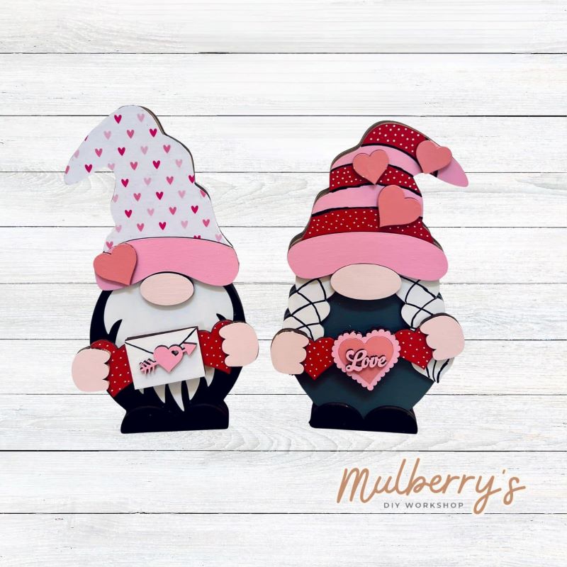 Our interchangeable mini gnomes are approximately 9" tall. They are 3 layers; therefore, they will stand freely. There are two choices. Hats and Hands are interchangeable and can be switched out for every holiday/season. Scrapbook paper embellishment is NOT included. Includes interchangeable gnomes and valentine inserts.
