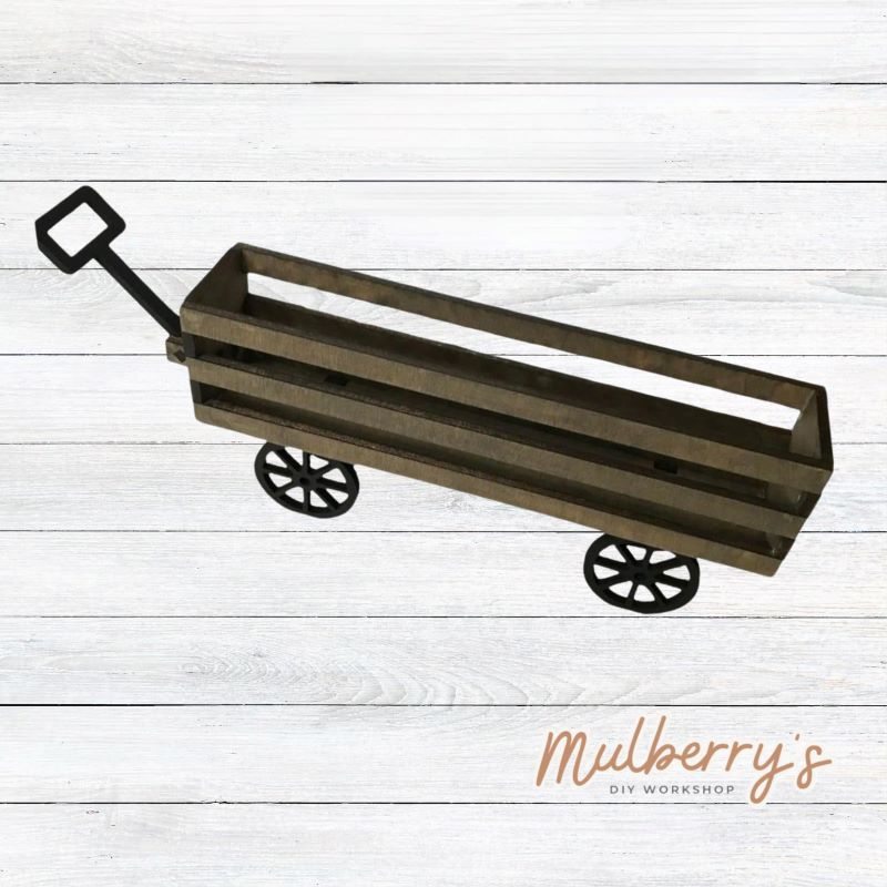 Our wagon is roughly 13-inches long. We offer a variety of interchangeable inserts to decorate for each season and holiday.