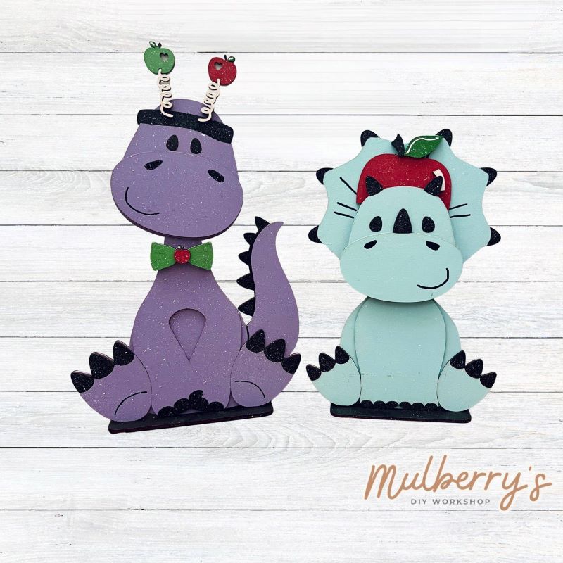 Our apple inserts pair perfectly with our Interchangeable Dinosaurs, pictured in the second picture and sold separately.
Please note that different inserts fit each type of dinosaur base differently. For our interchangeable dinosaurs, we recommended pairing each with the following:
-Brachiosaurus with Headband & Bow Tie
-T-Rex with either insert
-Triceratops with Apple