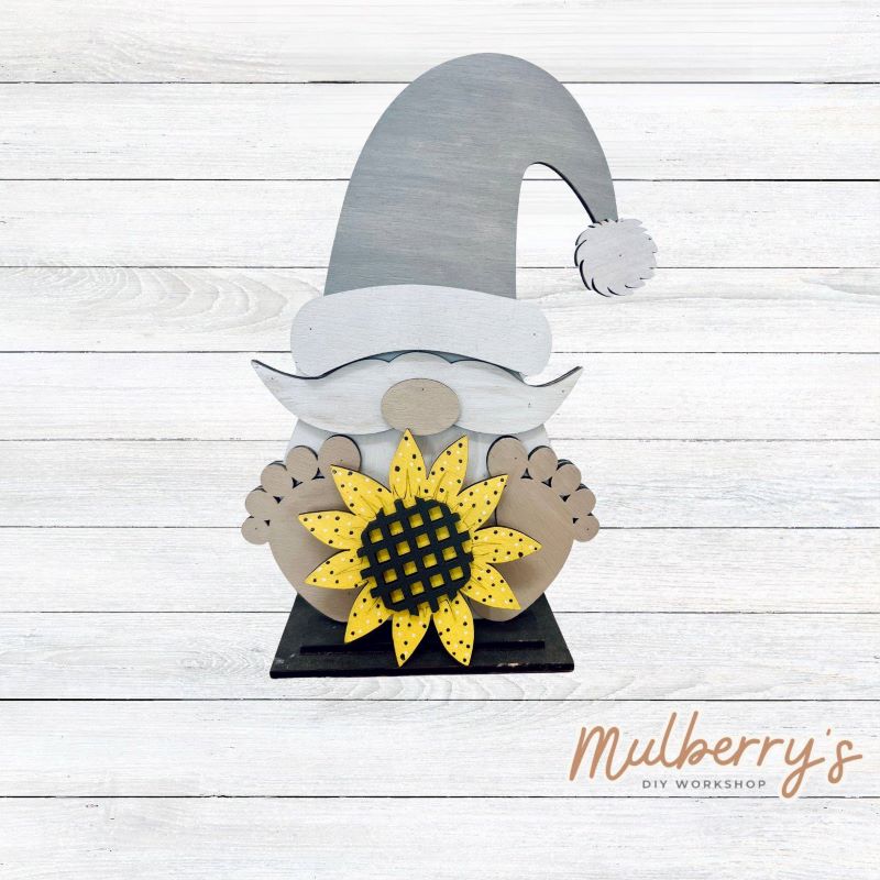 Our cute little interchangeable gnome sitter is a must! He measures 12-inches tall. Swap out his inserts to keep him ready for each holiday and season.
Includes interchangeable gnome with sunflower insert.