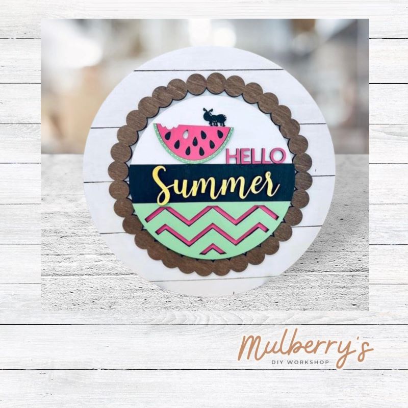 We love our large interchangeable plate with stand! It's approximately 11.5-inches is diameter and can display your favorite seasonal/holiday insert. This set includes the large interchangeable plate with stand and the watermelon hello summer insert.