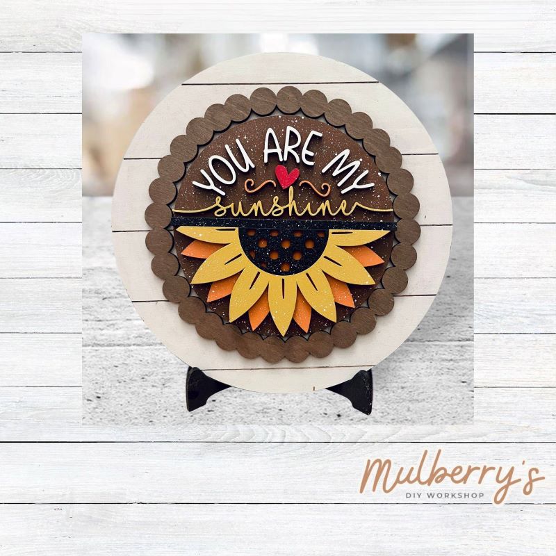 We love our large interchangeable plate with stand! It's approximately 11.5-inches is diameter and can display your favorite seasonal/holiday insert.
This set includes the large interchangeable plate with stand and the sunflower sunshine insert.