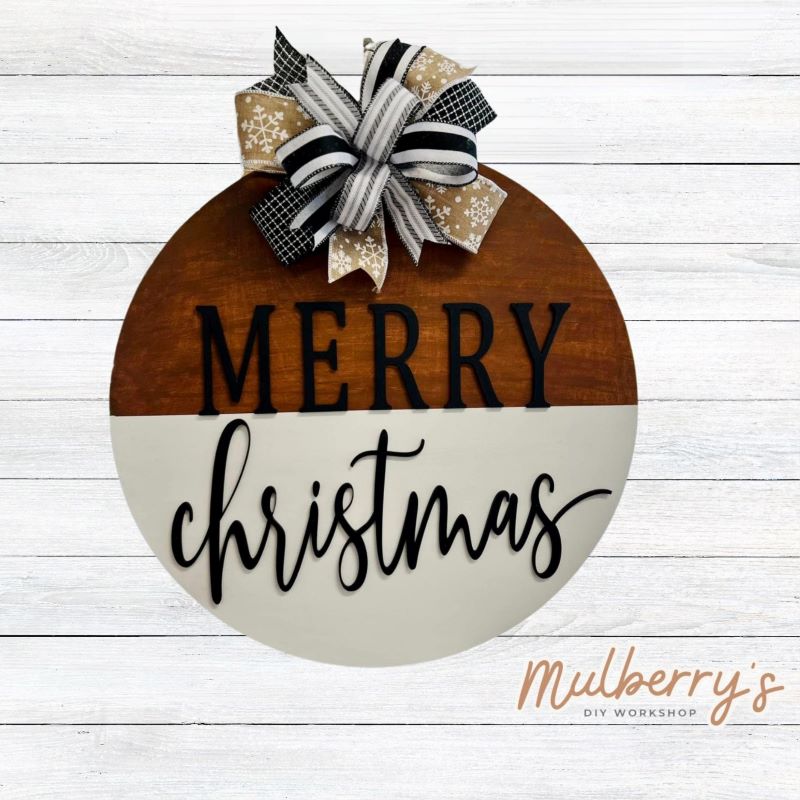 Our Merry Christmas 22" door hanger is perfect for the holiday season! Fancy bow is NOT included.