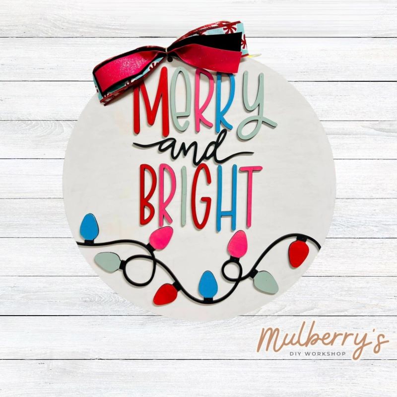 Decorate your front door with our Merry and Bright 18" door hanger for the Christmas season!
