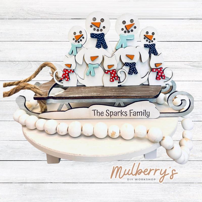 Our personalized family sled is even more stunning in person! Such an adorable project! Approximately 11.5" wide. Sled includes 4 family members. Additional family members/pets can be added for an extra $1 each.