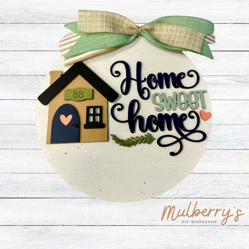 Decorate your home with our personalized home sweet home door hanger! Approximately 10.5" in diameter.