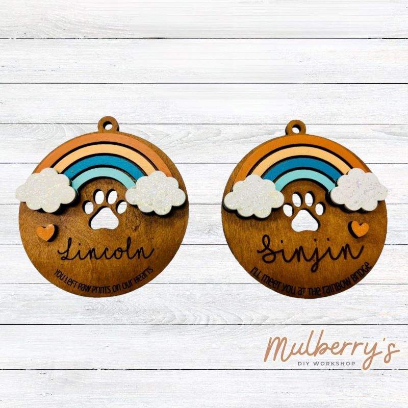 Remember your sweet friend with our personalized rainbow dog ornaments. Ornaments are approximately 4.5 inches in diameter. Your pet's name will be engraved in cursive.