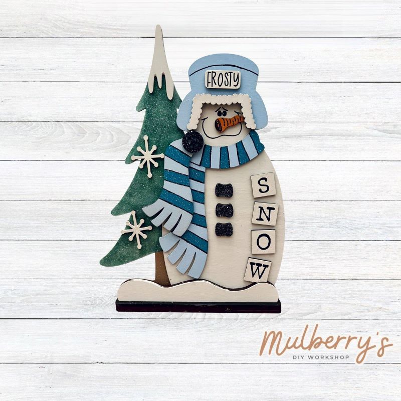 Our stand-up Frosty snowman shelf sitter is snow-tastic! He's approximately 11" tall by 8" wide. Includes a stand.