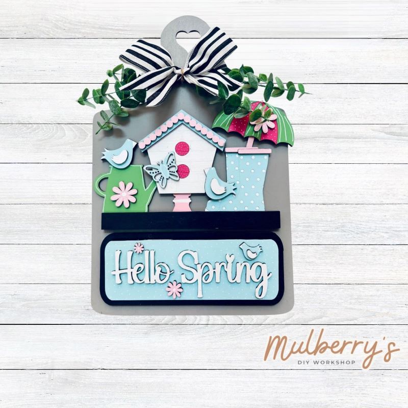 This Interchangeable Breadboard measures roughly 9" wide & 13.5" tall. This project can easily be changed out for holidays, seasons and other themes. Because the breadboard leans back with the use of an easel, no magnets or adhesive hook and loop is needed. The set includes the breadboard and spring inserts.