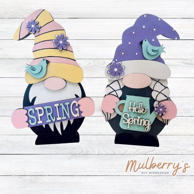 Our interchangeable mini gnomes are approximately 9" tall. They are 3 layers; therefore, they will stand freely. There are two choices. Hats and Hands are interchangeable and can be switched out for every holiday/season. Includes interchangeable gnomes and spring inserts.