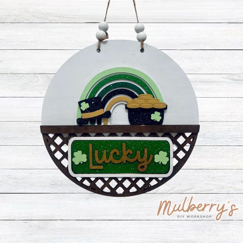 Welcome family and friends with our interchangeable lattice round door hanger! Simply swap out inserts to match the different holidays and seasons!
It's approximately 10.5" in diameter.
Includes: Lattice Round Door Hanger with St. Patty rainbow Inserts. Additional inserts are available to purchase.