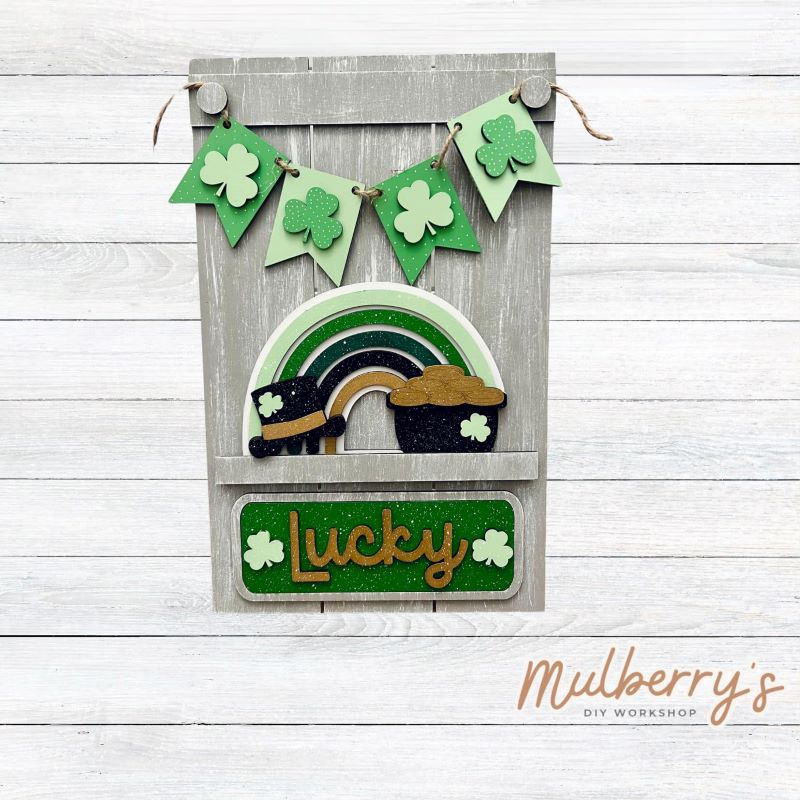 Our Interchangeable Pallet Stand measures roughly 15" tall by 9" wide.
This project can easily be changed out for holidays, seasons and other themes.
The set includes the pallet stand and St. Patty rainbow inserts.