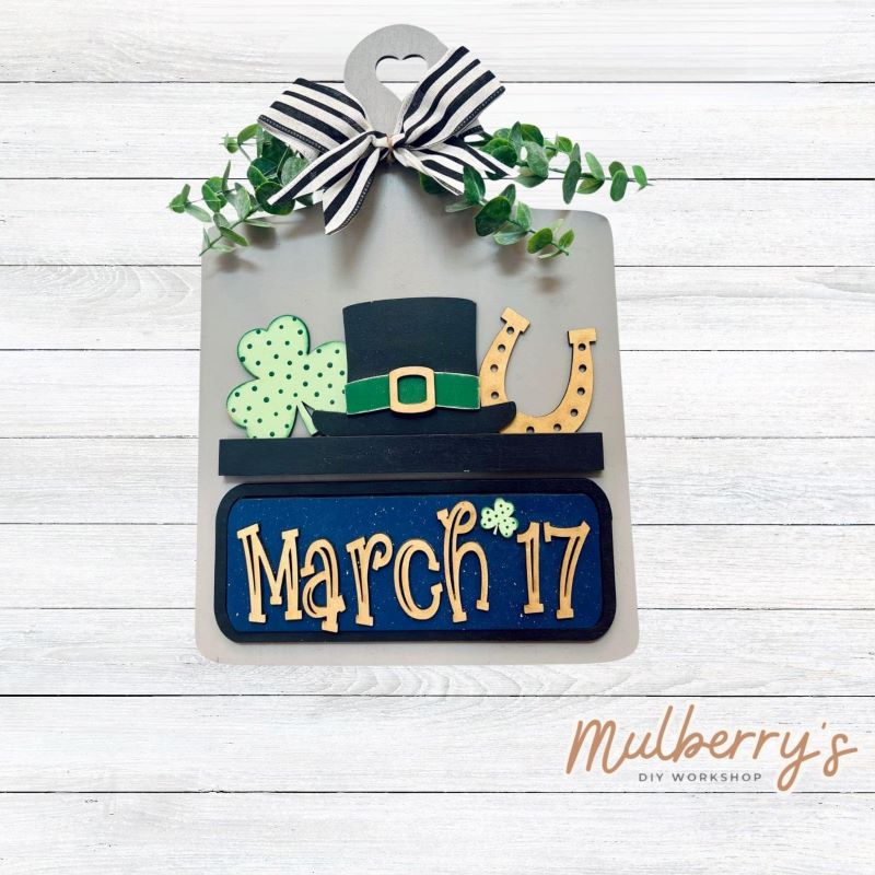 This Interchangeable Breadboard measures roughly 9" wide & 13.5" tall. This project can easily be changed out for holidays, seasons and other themes. Because the breadboard leans back with the use of an easel, no magnets or adhesive hook and loop is needed. The set includes the breadboard and st. patty inserts.