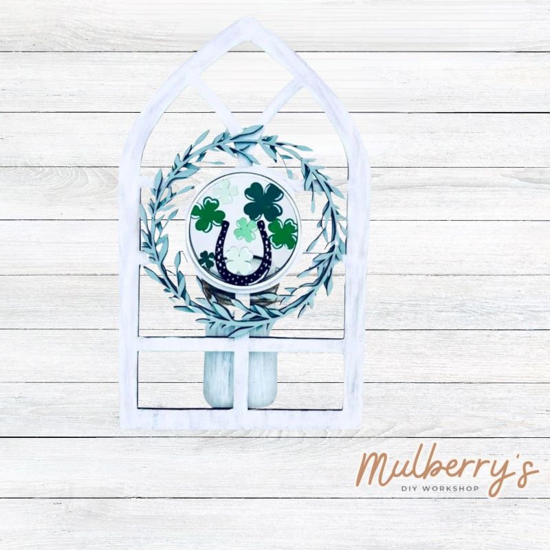 We love our interchangeable window! It's approximately 16" tall by 10" wide and can display your favorite seasonal/holiday insert. This set includes the interchangeable window and st. patty insert.