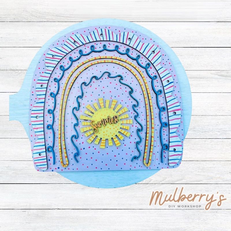 Our summer rainbow is such a fun project to paint! Approximately 8.5" tall. Optional stand is available.