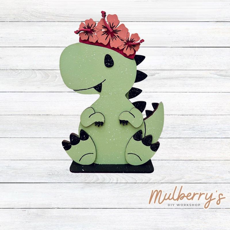 Our t-rex dinosaur is super cute! It's approximately 8" tall and can be paired with your favorite seasonal/holiday insert.
This set includes the interchangeable t-rex dinosaur and your choice of summer inserts:
-Headband with Bow Tie
-Headbow
-Tropical Flower Lei
Please note that different inserts fit each type of dinosaur base differently. For our interchangeable t-rex, we recommended pairing it with the headbow insert.