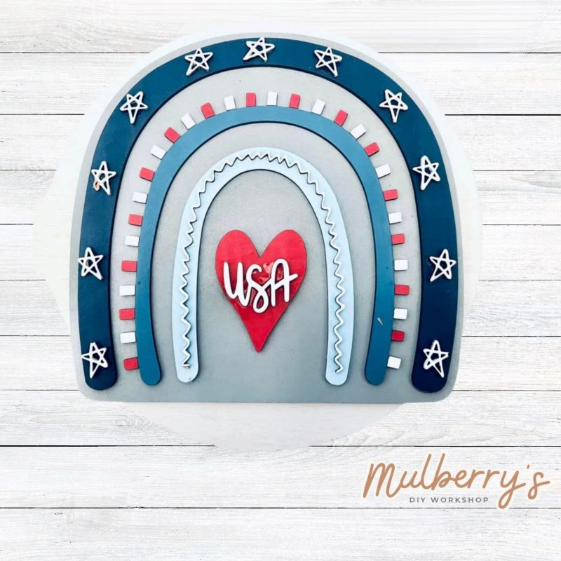 Our USA rainbow is such a fun project to paint! Approximately 8.5" tall. Optional stand is available.