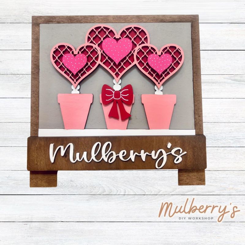 Welcome family and friends with our interchangeable desk easel! Simply swap out inserts to match the different holidays and seasons! It's approximately 10.5" tall. Includes: Desk Easel with Valentine Flower Insert.