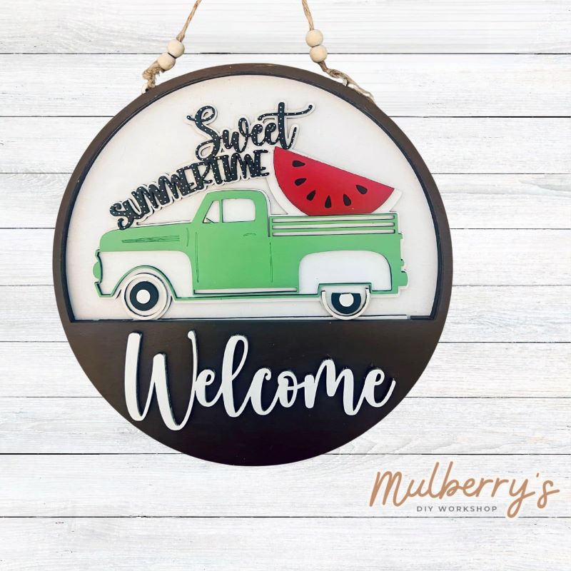 Welcome family and friends with our interchangeable welcome door hanger! Simply swap out inserts to match the different holidays and seasons! It's approximately 10.5" in diameter. Includes: Welcome Door Hanger with Watermelon Sweet Summertime Insert. Additional inserts are available to purchase.