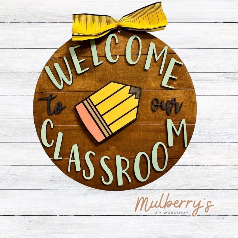 Brighten up your classroom with our 18" welcome classroom door hanger!