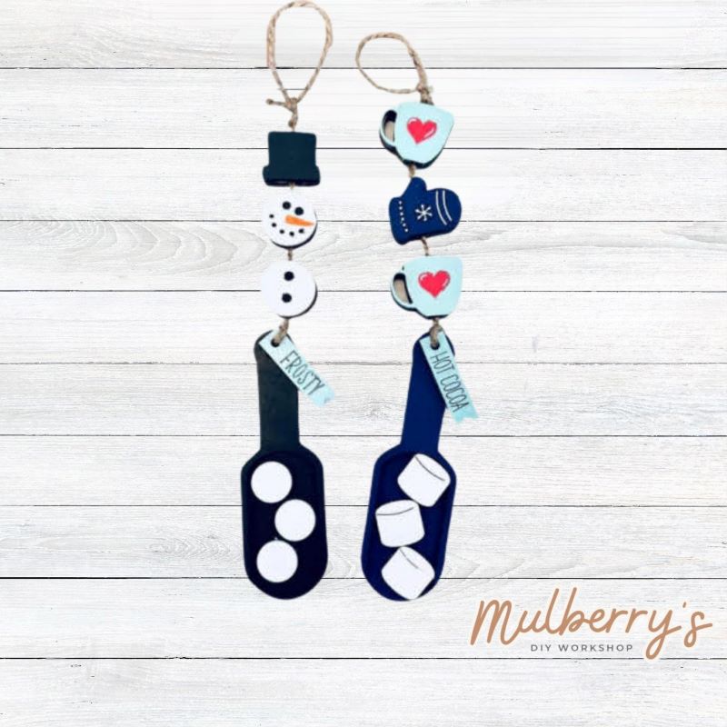 Our winter scoops are so versatile! Change them out seasonally and display them on your shelves or tiered trays! Additional scoops are available for different holidays and seasons.