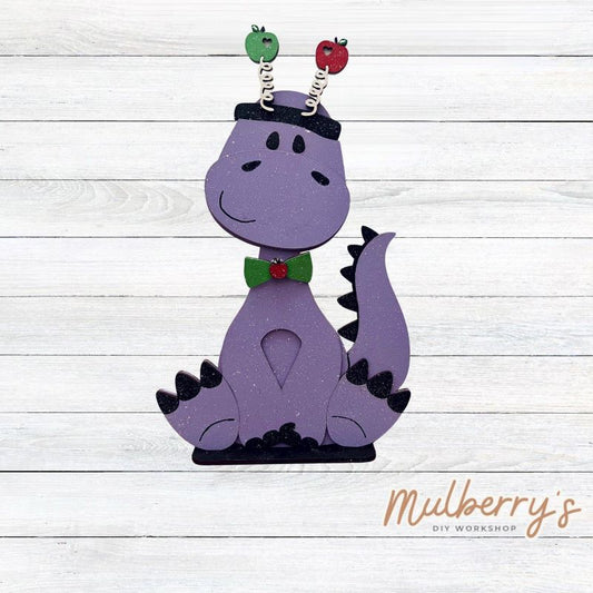 Our brachiosaurus dinosaur is super cute! It's approximately 13" tall and can be paired with your favorite seasonal/holiday insert.

This set includes the interchangeable brachiosaurus dinosaur and your choice of apple inserts:

-Headband with Bow Tie

-Apple

Please note that different inserts fit each type of dinosaur base differently. For our interchangeable brachiosaurus, we recommended pairing it with the headband and bow tie inserts.