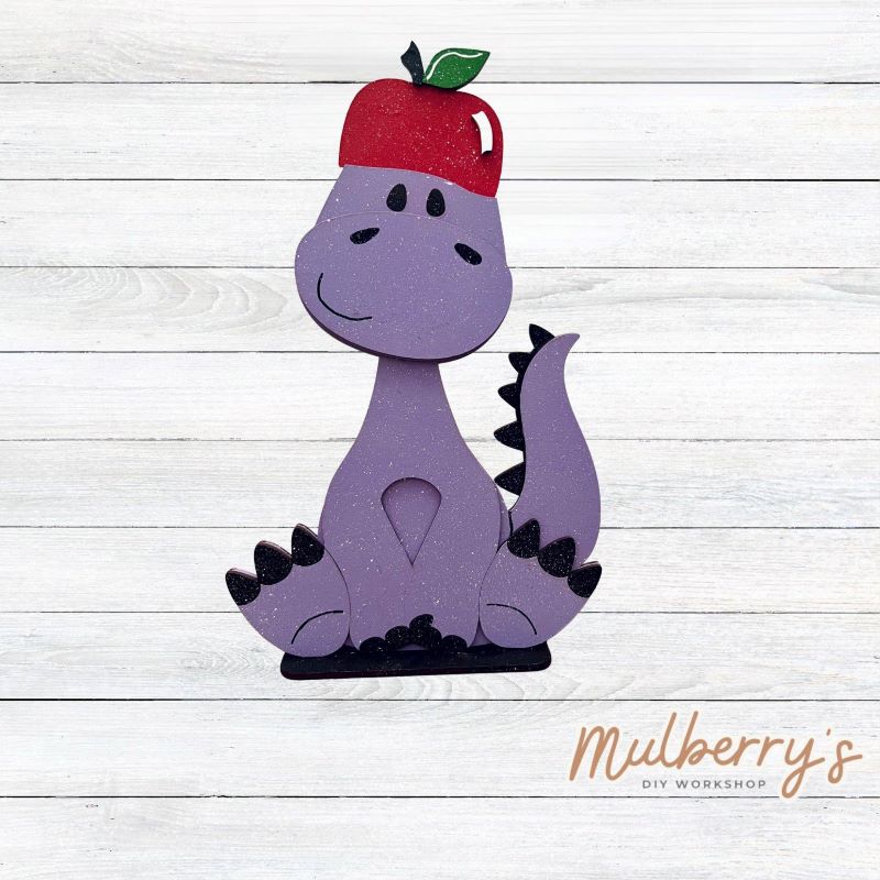 Our brachiosaurus dinosaur is super cute! It's approximately 13" tall and can be paired with your favorite seasonal/holiday insert.

This set includes the interchangeable brachiosaurus dinosaur and your choice of apple inserts:

-Headband with Bow Tie

-Apple

Please note that different inserts fit each type of dinosaur base differently. For our interchangeable brachiosaurus, we recommended pairing it with the headband and bow tie inserts.