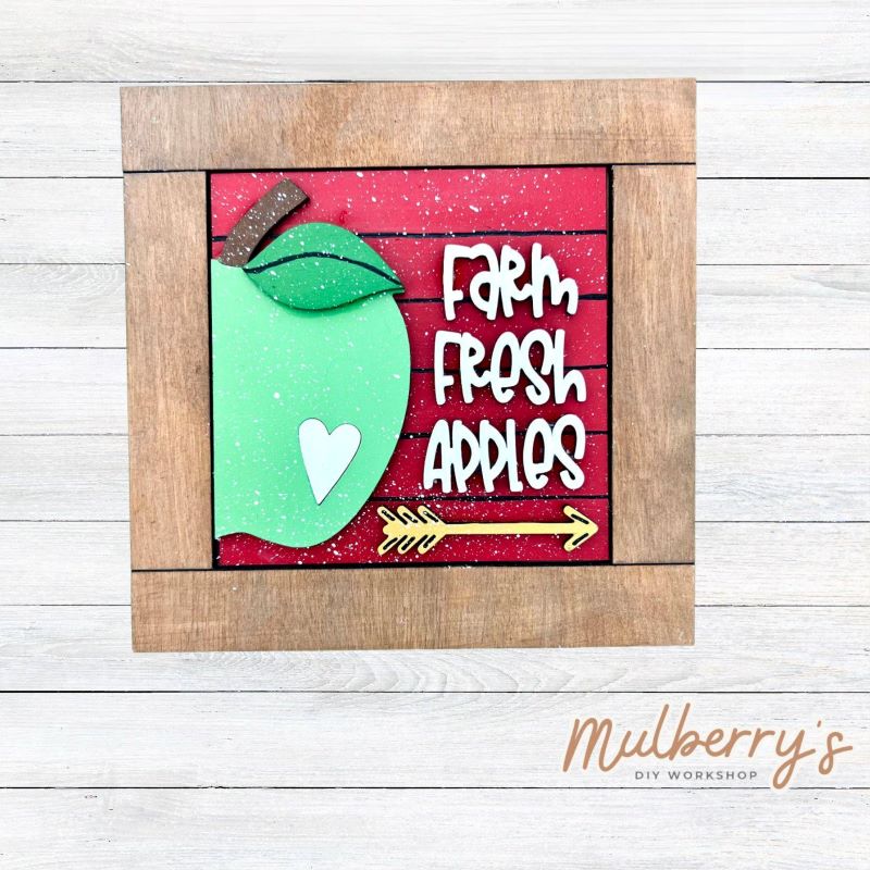 Our interchangeable square frame is the perfect way to display the different seasonal and holiday decorative tiles! Choose your favorite apple decorative tile to display inside! This listing includes the base and choice of one apple insert. Approximately 6" in diameter.