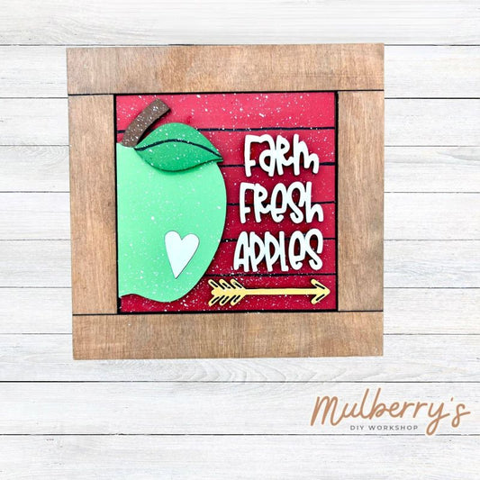 Our interchangeable square frame is the perfect way to display the different seasonal and holiday decorative tiles! Choose your favorite apple decorative tile to display inside! This listing includes the base and choice of one apple insert. Approximately 6" in diameter.