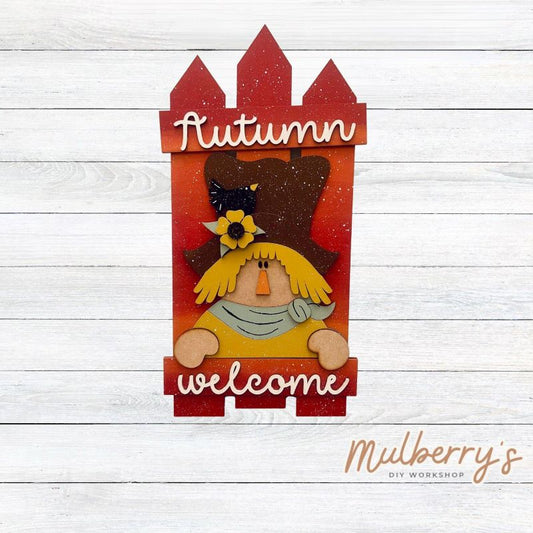 Cuteness overload!!! Welcome autumn with our scarecrow fence mega shelf sitter! It's approximately 18" tall by 9" wide.