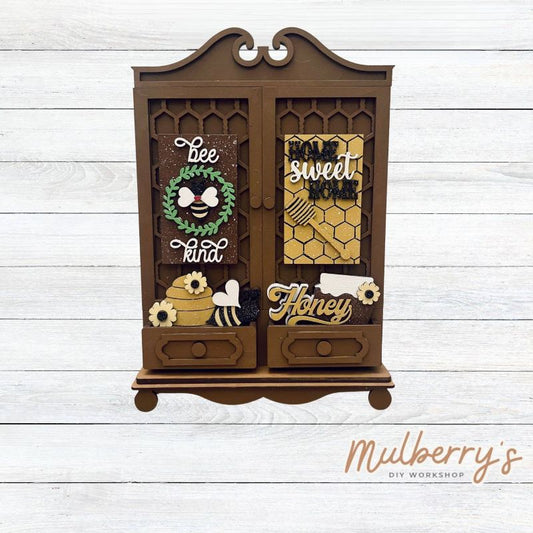 It doesn't get any cuter than our new double cottage mega shelf sitter! It's the perfect add-on accessory to your decor at approximately 16" tall by 11" wide.

Includes: Double Cottage and Bee Inserts pictured.