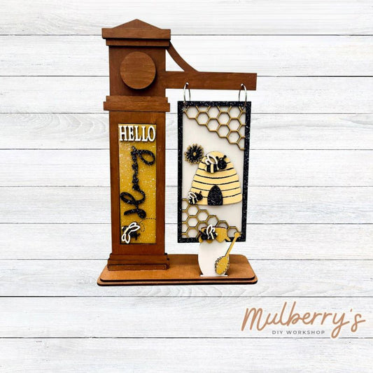 Our interchangeable mega post is so versatile! It's roughly 18.5" tall by 10.5" wide. Swap out different inserts throughout the year.

This is a set for the interchangeable mega post and bee inserts.