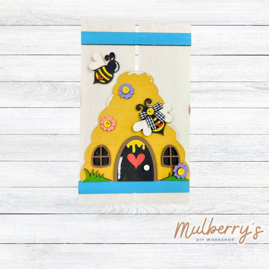 Buzz into summer with our new beehive pallet sign! It's approximately 10.5" tall by 6" wide.